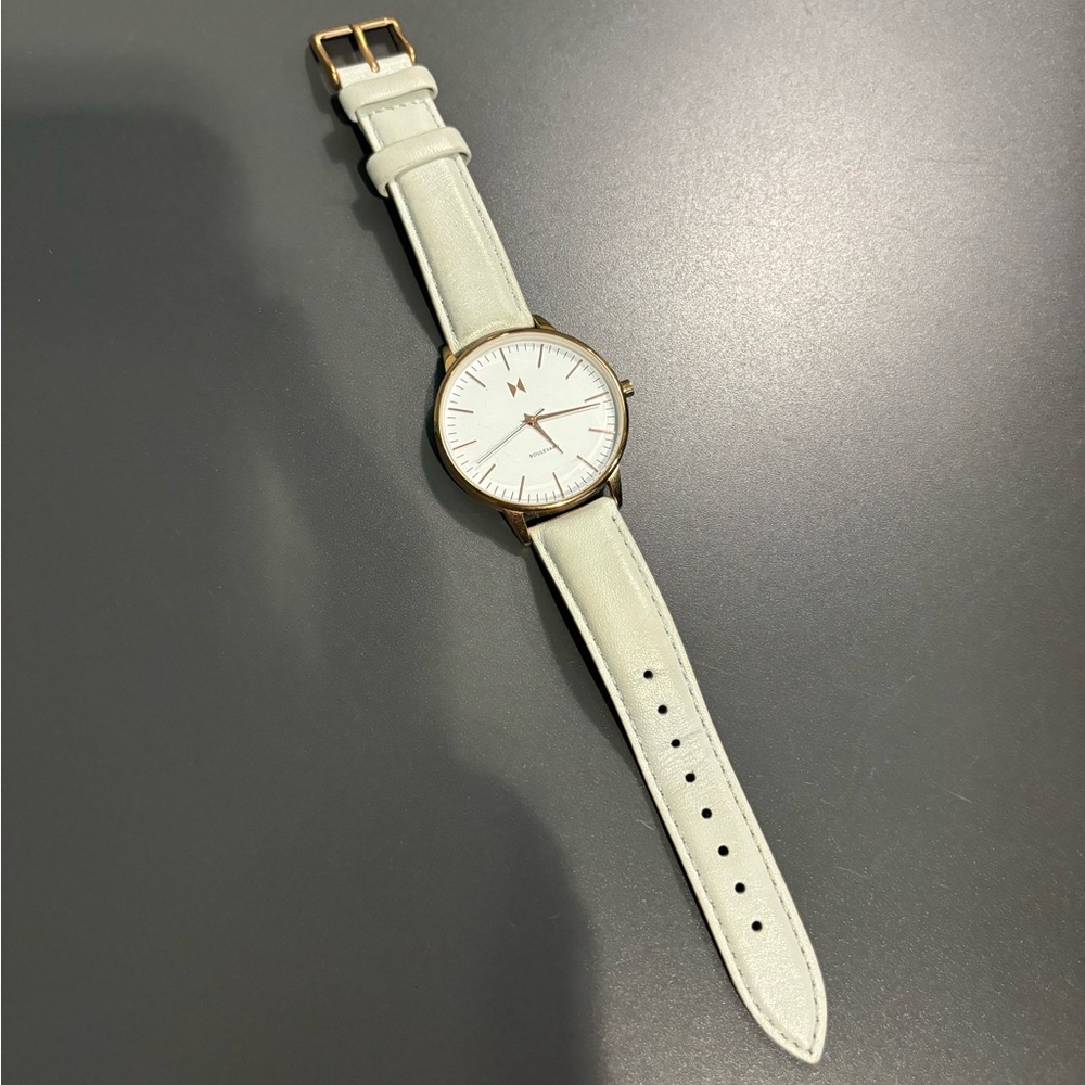 Rose gold and gray boulevard MVMT watch